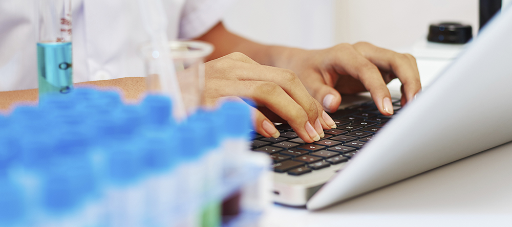 woman typing on a keyboard